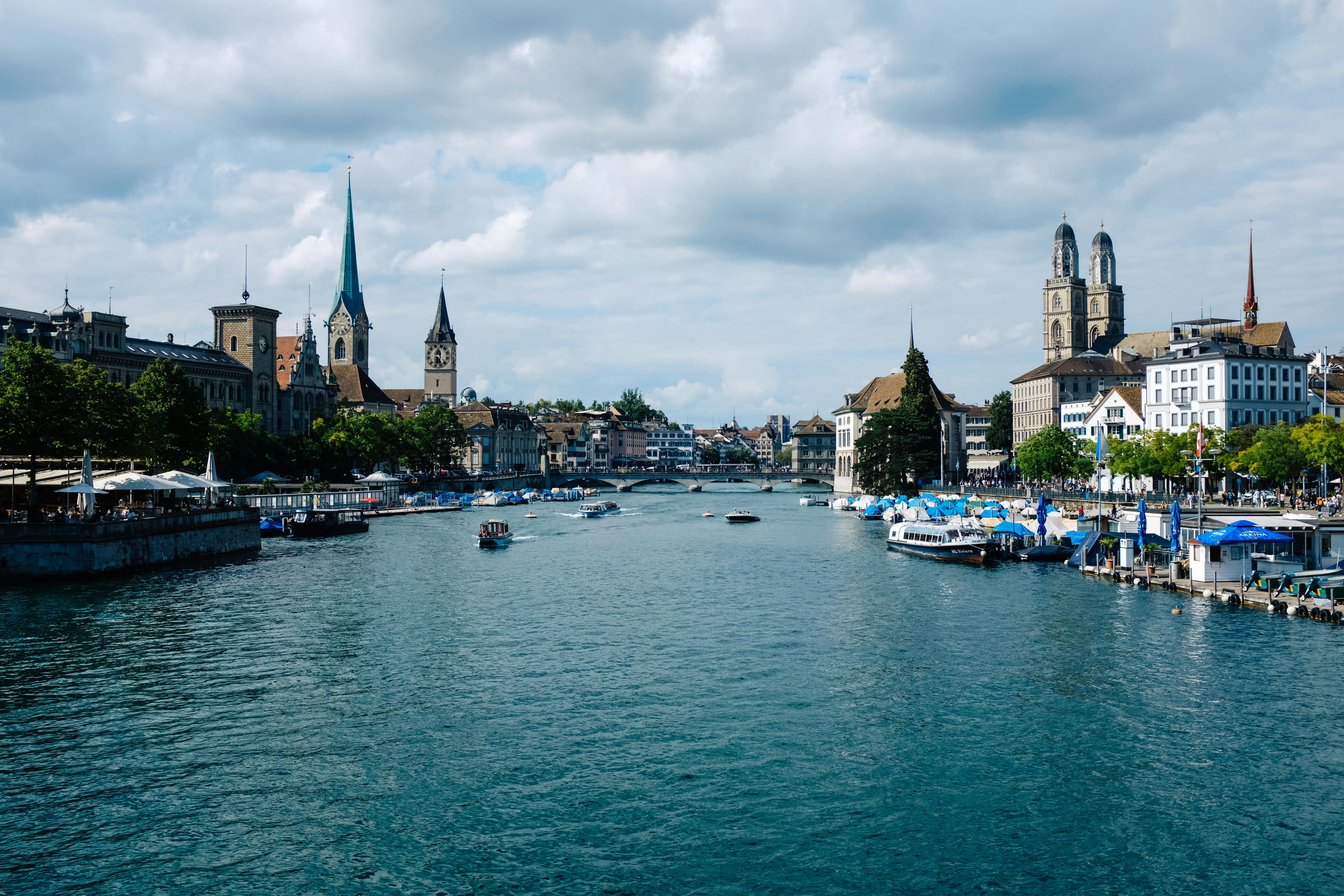 Zurich waterfront and Grossmunster towers by the Limmat River